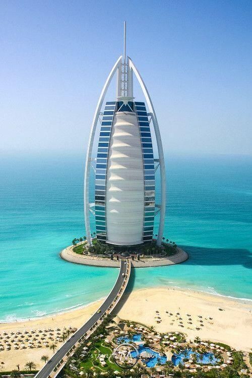 Hotel Burj Al Arab, Dubai. Modelled as the wind-blown sail of an Arab Dhow with a very high tech twist, the Burj Al Arab stands for all that is over the top and excessive in the Emirates.