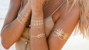 4 Ways to Rock Metallic Tattoos This Year